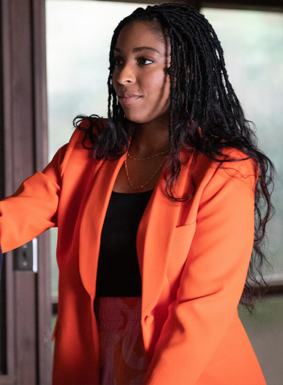 Jessica Williams Shrinking Orange Blazer